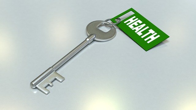 Image of a key with a health tag on it to show we can take charge of our health with the right knowledge and not live in fear.