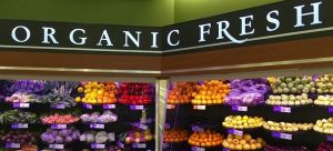 An organic produce section to represent what to look for when avoiding GMOs. Choose organic or non-GMO certified.