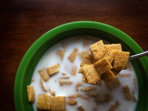 Image of milk in a bowl of cereal to reference how milk has become a huge part of people's diets.