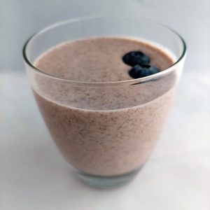 An image of a blueberry, strawberry, banana smoothie.