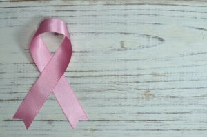 An image of a pink ribbon to talk about cancer and the purpose of them..