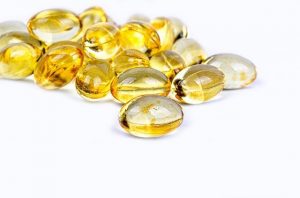 An image of a bunch of gel capsules that are supposed to be Vitamin D which are great for immune health.