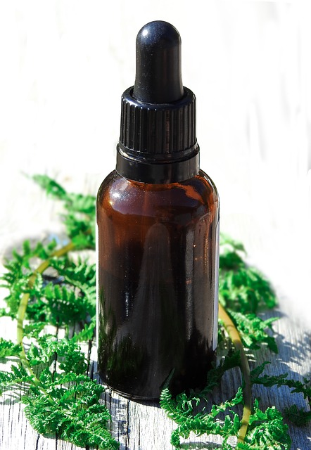 An image of a bottle of essential oil to discuss how essential oils can help improve sleep or help with falling asleep.
