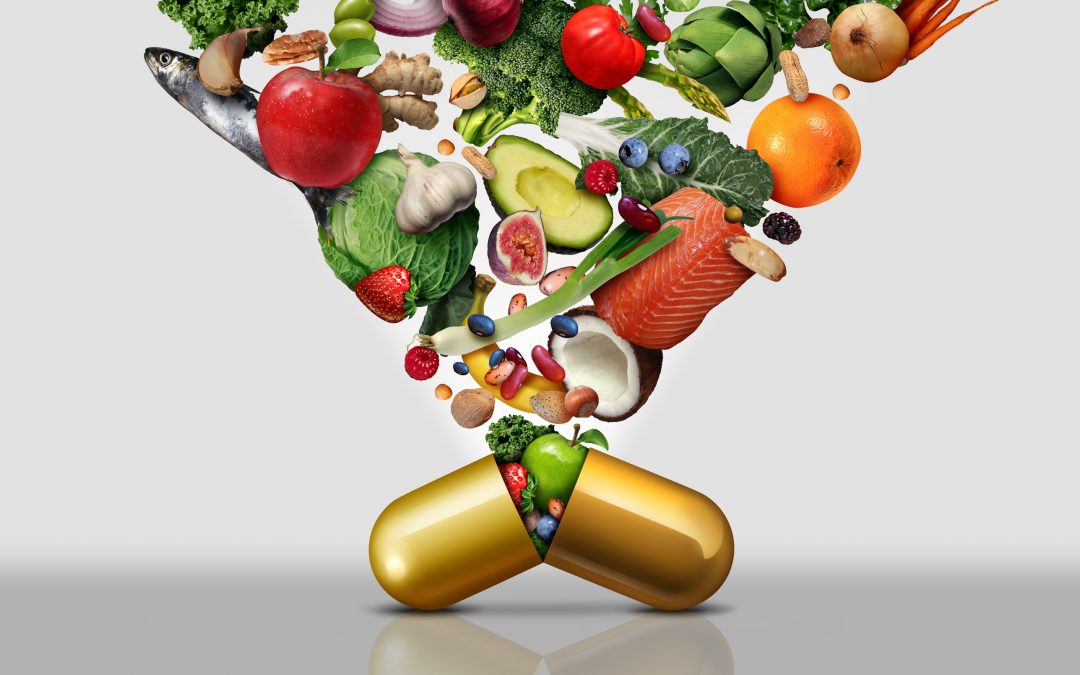 An image of a bunch of fruits and vegetables going into a capsule to talk about problems with synthetic vitamins, why where you buy them from matters, why ingredients matter, and how to find quality supplements.