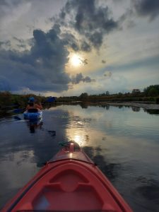 An image of me and my husband kayaking to talk about how exercise helps with mind, body and soul.