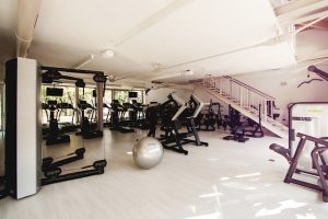 An image of a gym to talk about how gyms offer exercises that often don't fit the definition of what HIIT is.