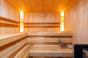 An image of a sauna to talk about how a sauna detox is one way a person can detox (HOCATT). 