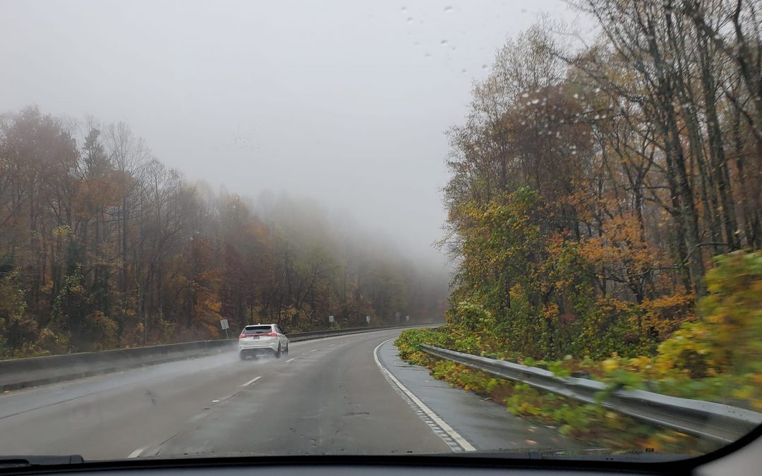 This is an image looking out the window of a car on the road with lots of fog to discuss how you have to appreciate your life journey, no matter how questionable it might be.