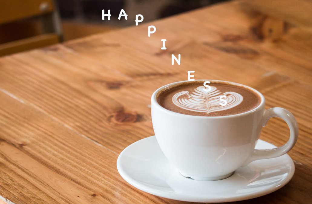 An image of a coffee cup and the words "happiness" being poured into the cup to talk about how we should pour a cup of happiness every day.
