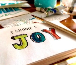 An image the the words "choose joy" to talk about how to be content with yourself and not need anyone else's approval to be happy.