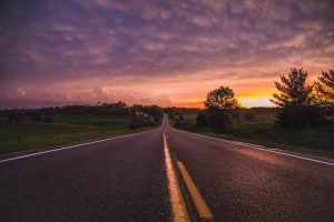 An image of a road to talk about appreciating and enjoying the journey toward your goals and not just being happy once you reach your ultimate goal.